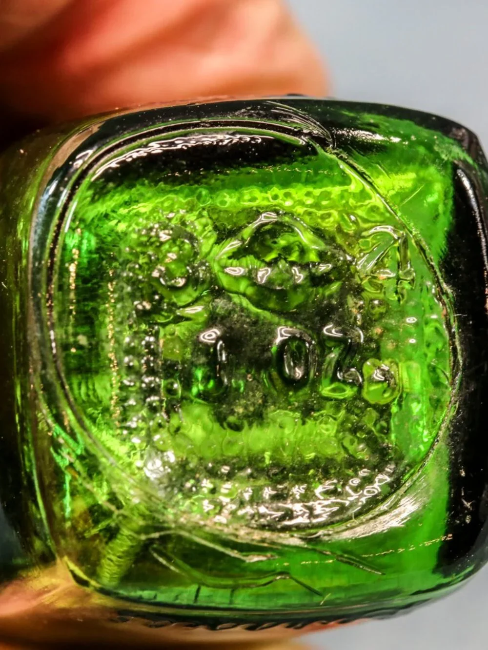 Vintage Green Glass Pill type bottles with inscriptions.  1 oz.